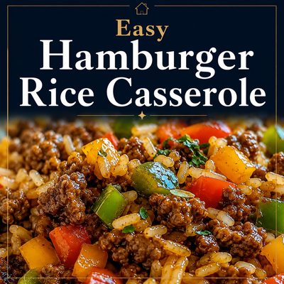 Hamburger rice casserole made with seasoned ground beef, rice, and colorful bell peppers in a skillet.